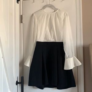 Black and white pleated blouse cocktail dress